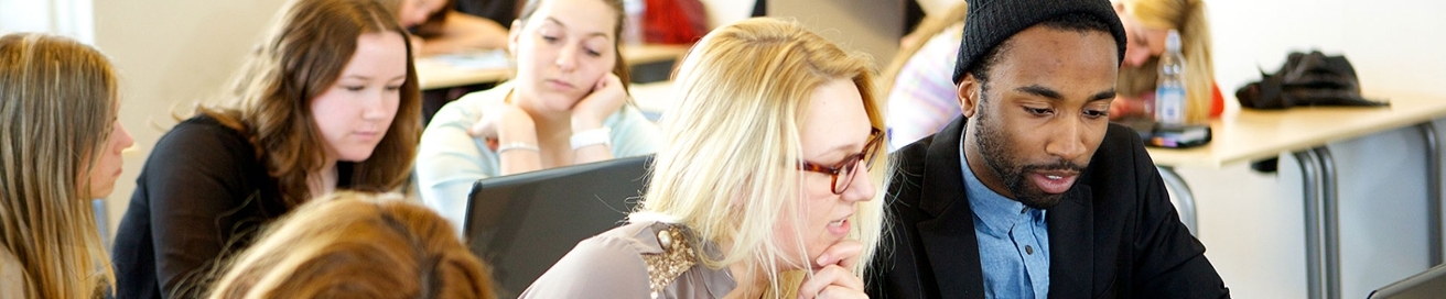 Students studying during a lecture.